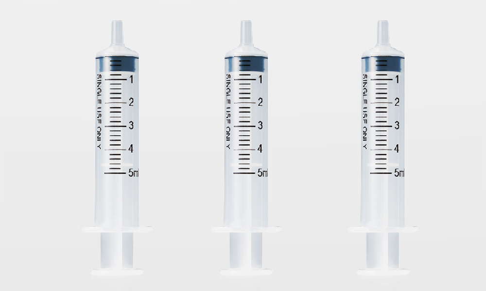 Disposable low resistance syringe